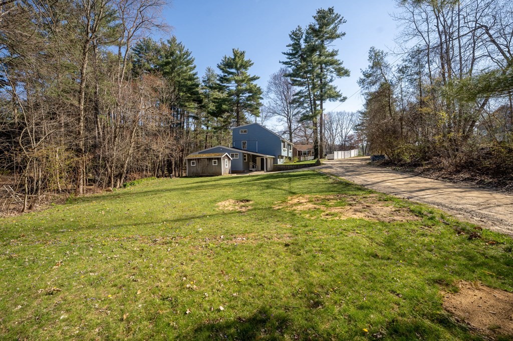 7 Lake Ridge Drive Holland, MA 01521 - Photo 34 of 42 a swimming pool is sitting in the middle of a yard