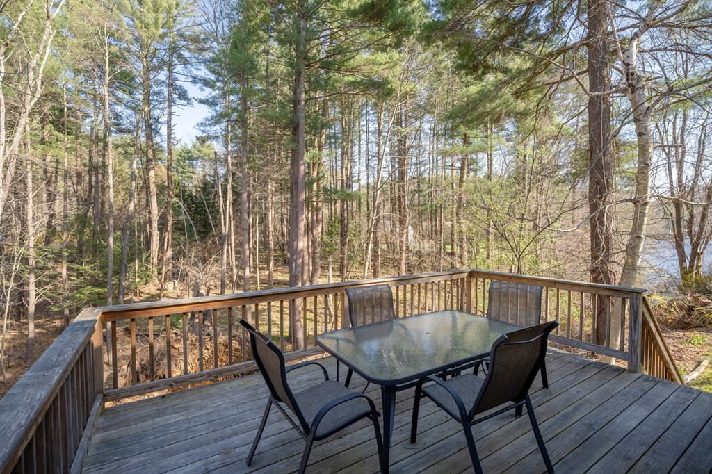 7 Lake Ridge Drive Holland, MA 01521 - Photo 36 of 42 a view of a chairs and table on the deck