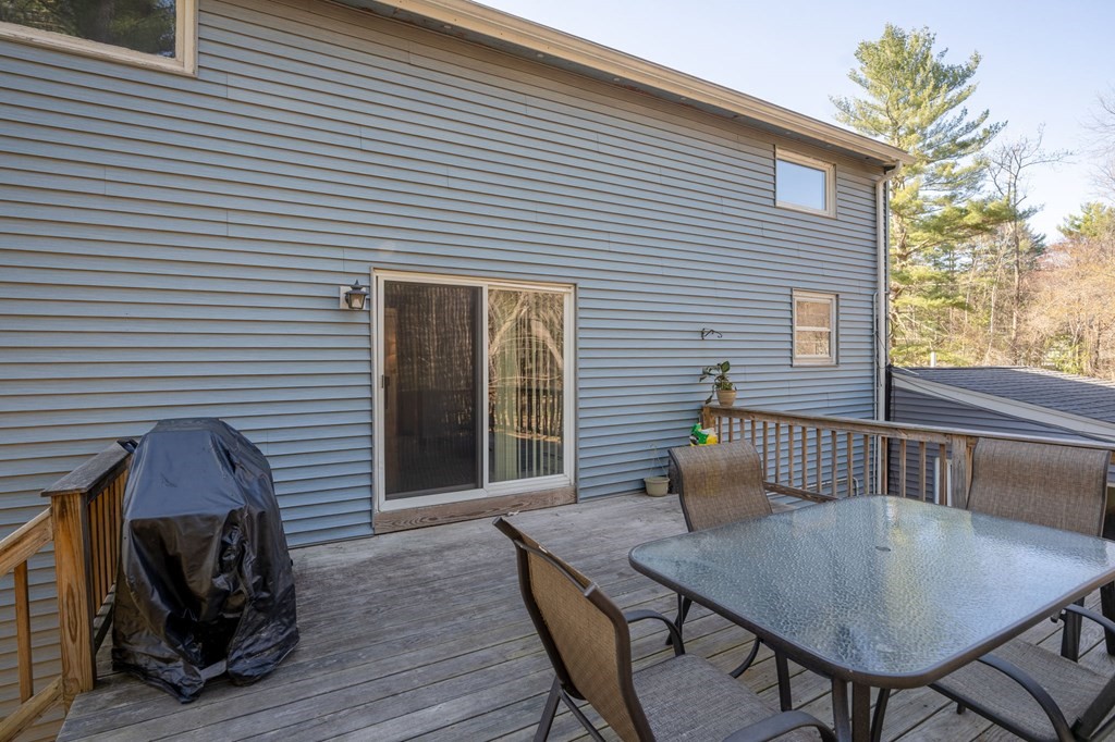 7 Lake Ridge Drive Holland, MA 01521 - Photo 37 of 42 a balcony with table and chairs