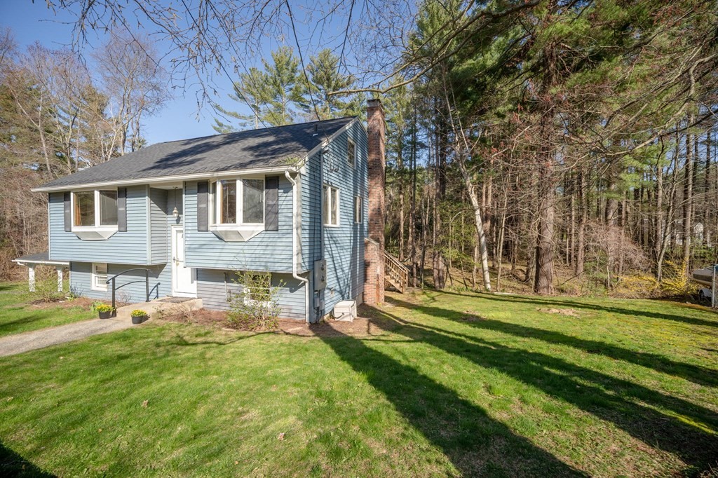 7 Lake Ridge Drive Holland, MA 01521 - Photo 39 of 42 a front view of a house with a yard