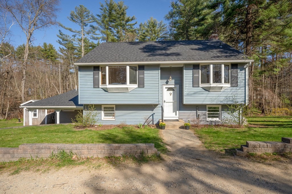 7 Lake Ridge Drive Holland, MA 01521 - Photo 40 of 42 a front view of a house with a yard