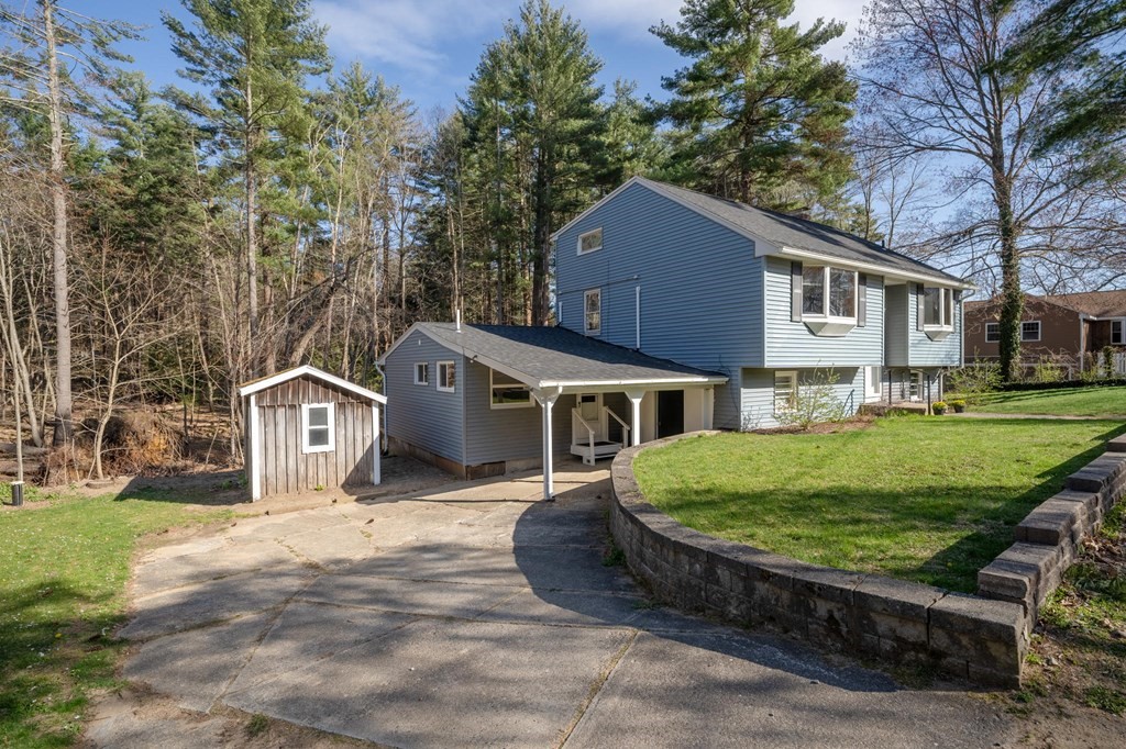 7 Lake Ridge Drive Holland, MA 01521 - Photo 42 of 42 front view of a house with a yard