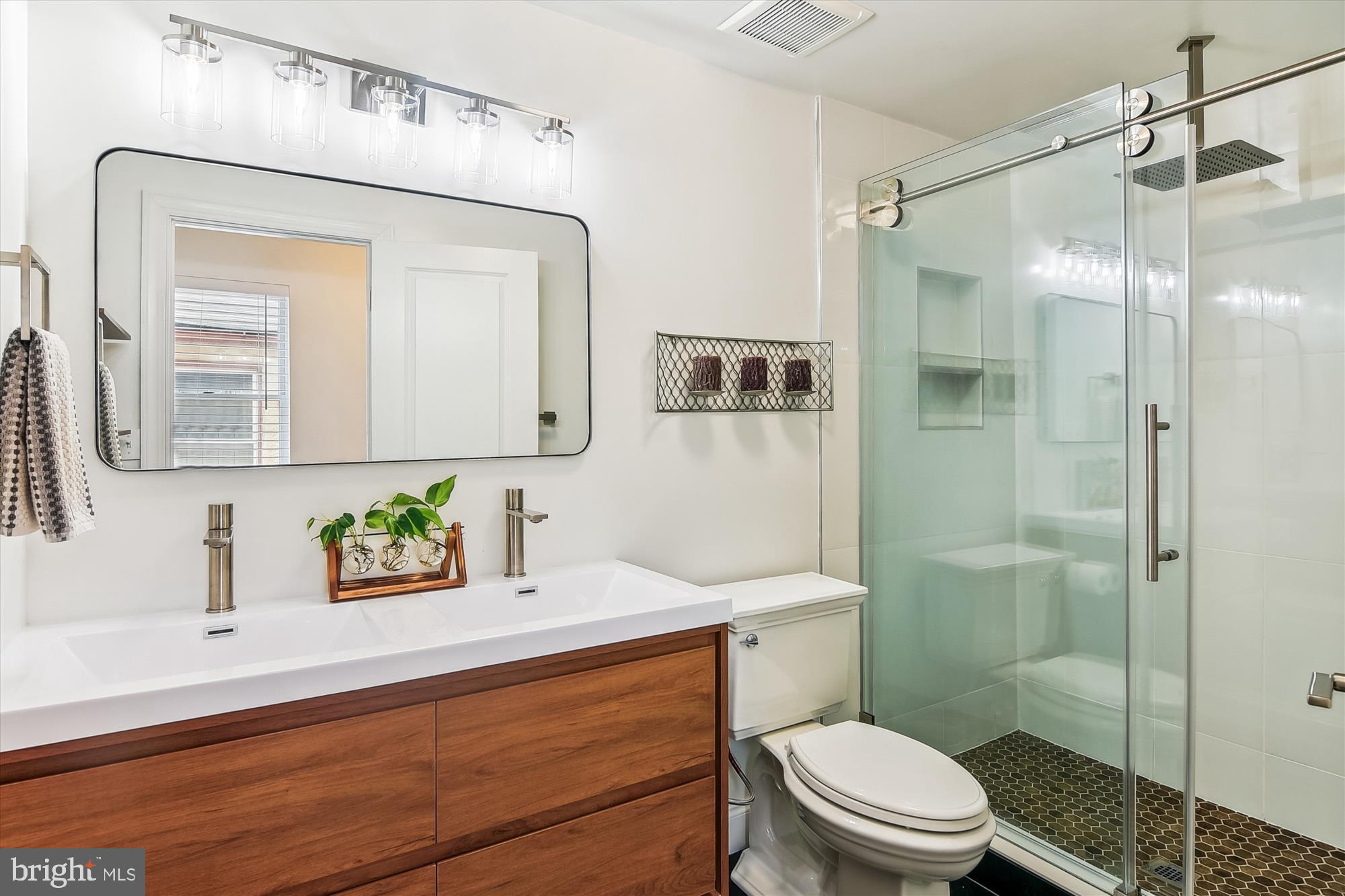 1157 Riverside Avenue Baltimore, MD 21230 - Photo 27 of 42 Primary bath elevates everyday luxury