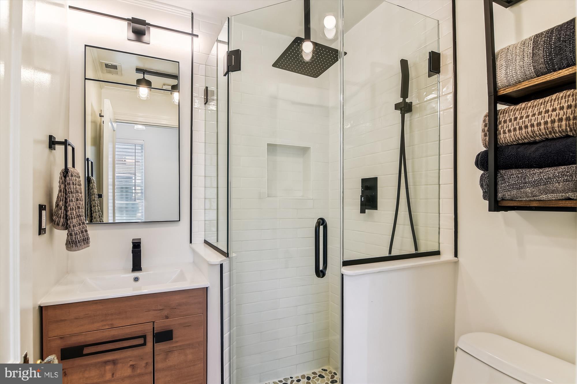 1157 Riverside Avenue Baltimore, MD 21230 - Photo 28 of 42 Hall Bath (2024) boasts sleek finishes