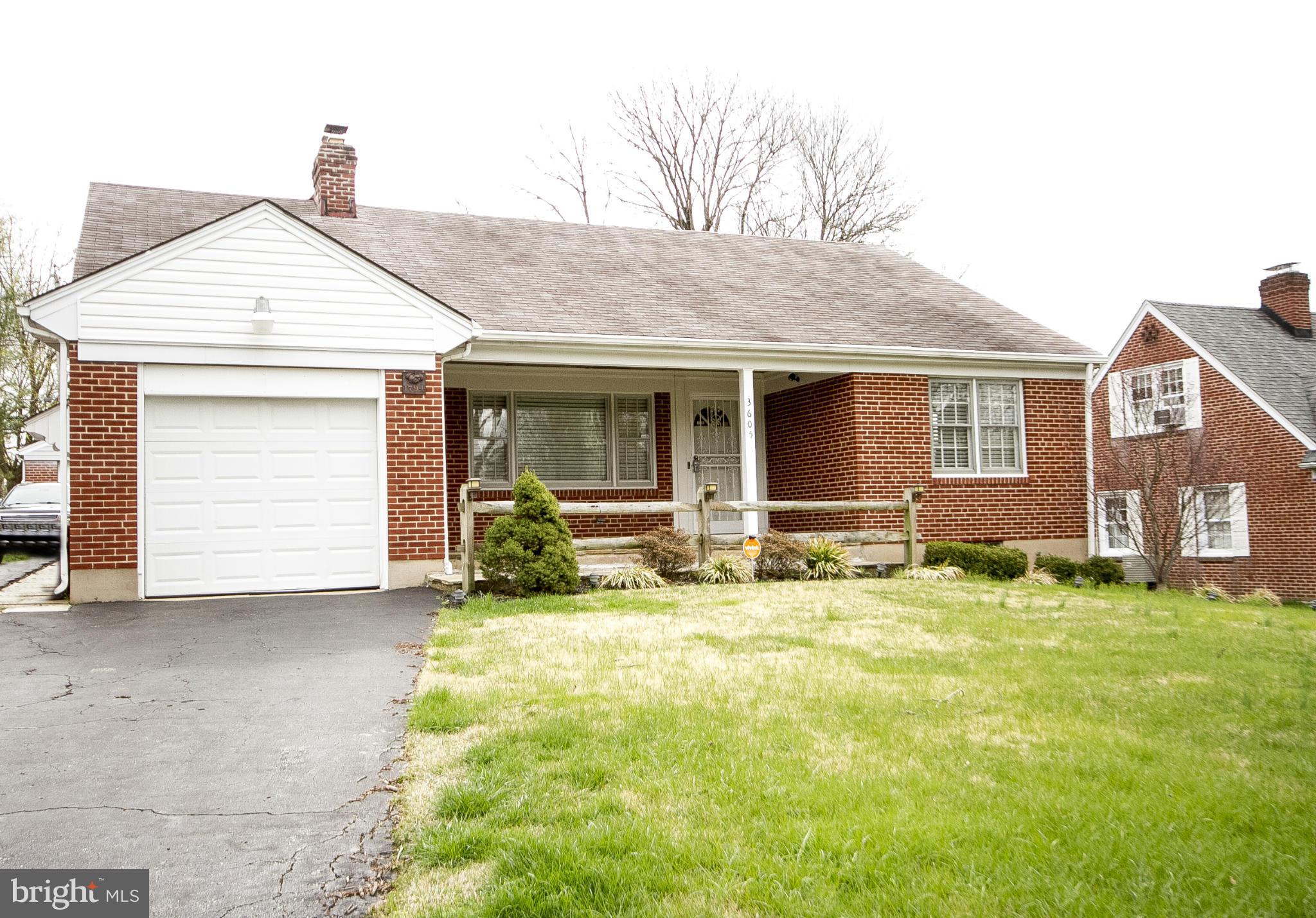 3605 Stoneybrook Road Randallstown, MD 21133 - Photo 1 of 25 a view of a house with a yard and sitting area