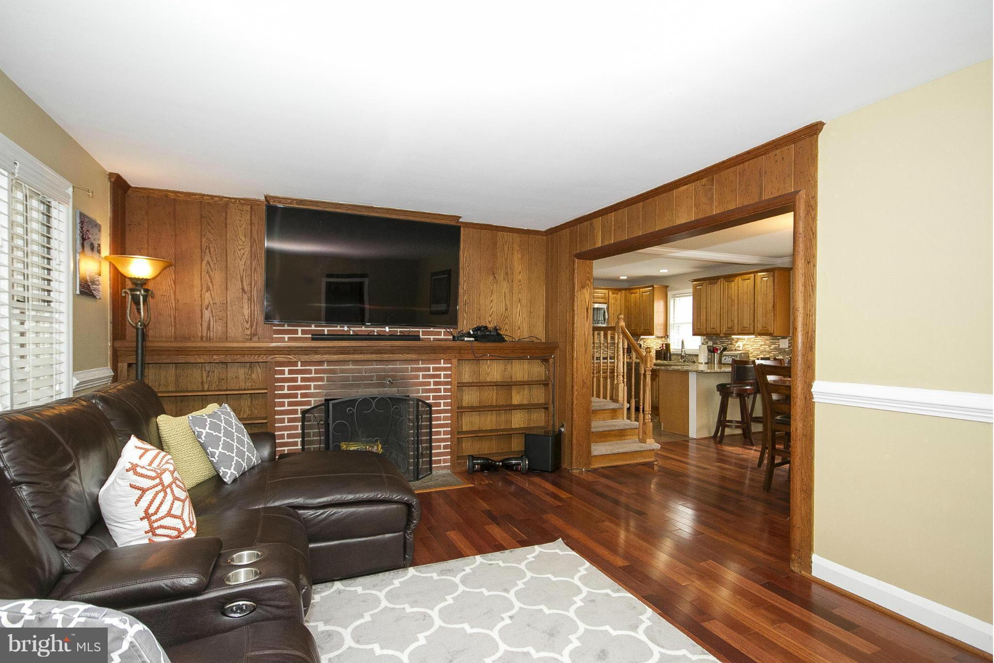 3605 Stoneybrook Road Randallstown, MD 21133 - Photo 2 of 25 a living room with furniture and a flat screen tv