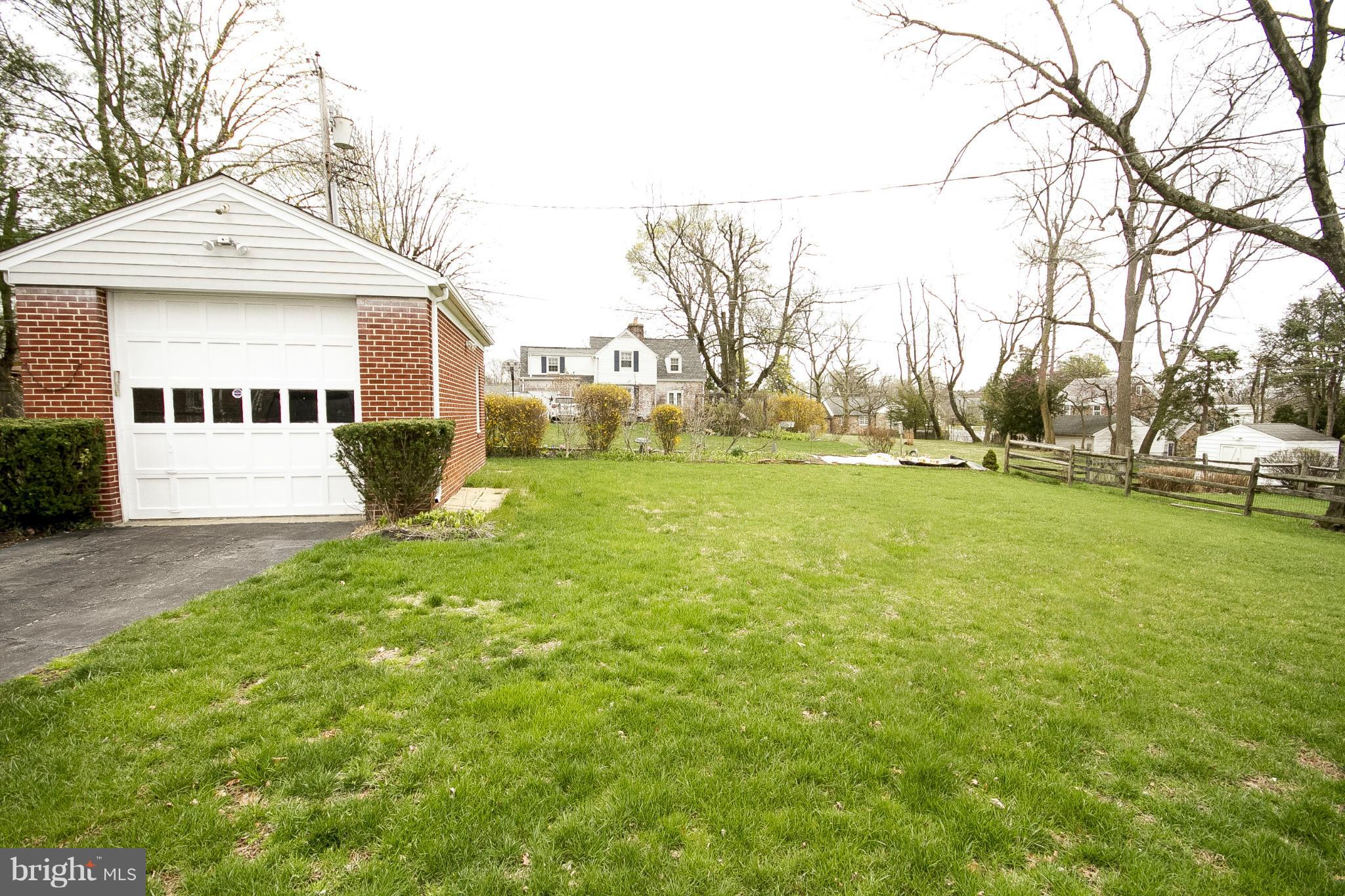 3605 Stoneybrook Road Randallstown, MD 21133 - Photo 23 of 25 a view of a building with a yard