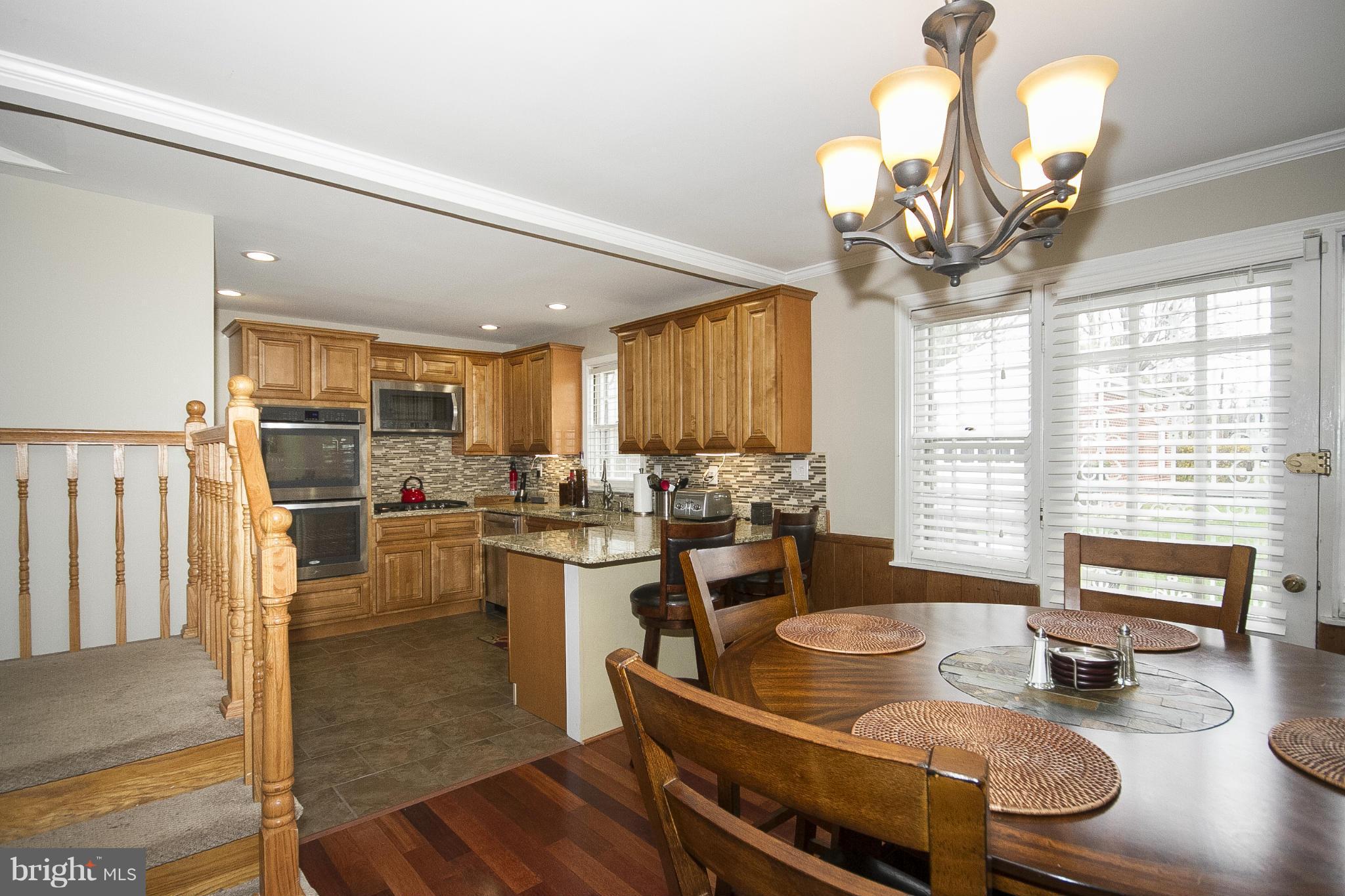 3605 Stoneybrook Road Randallstown, MD 21133 - Photo 7 of 25 a view of a dining room with furniture window and outside view