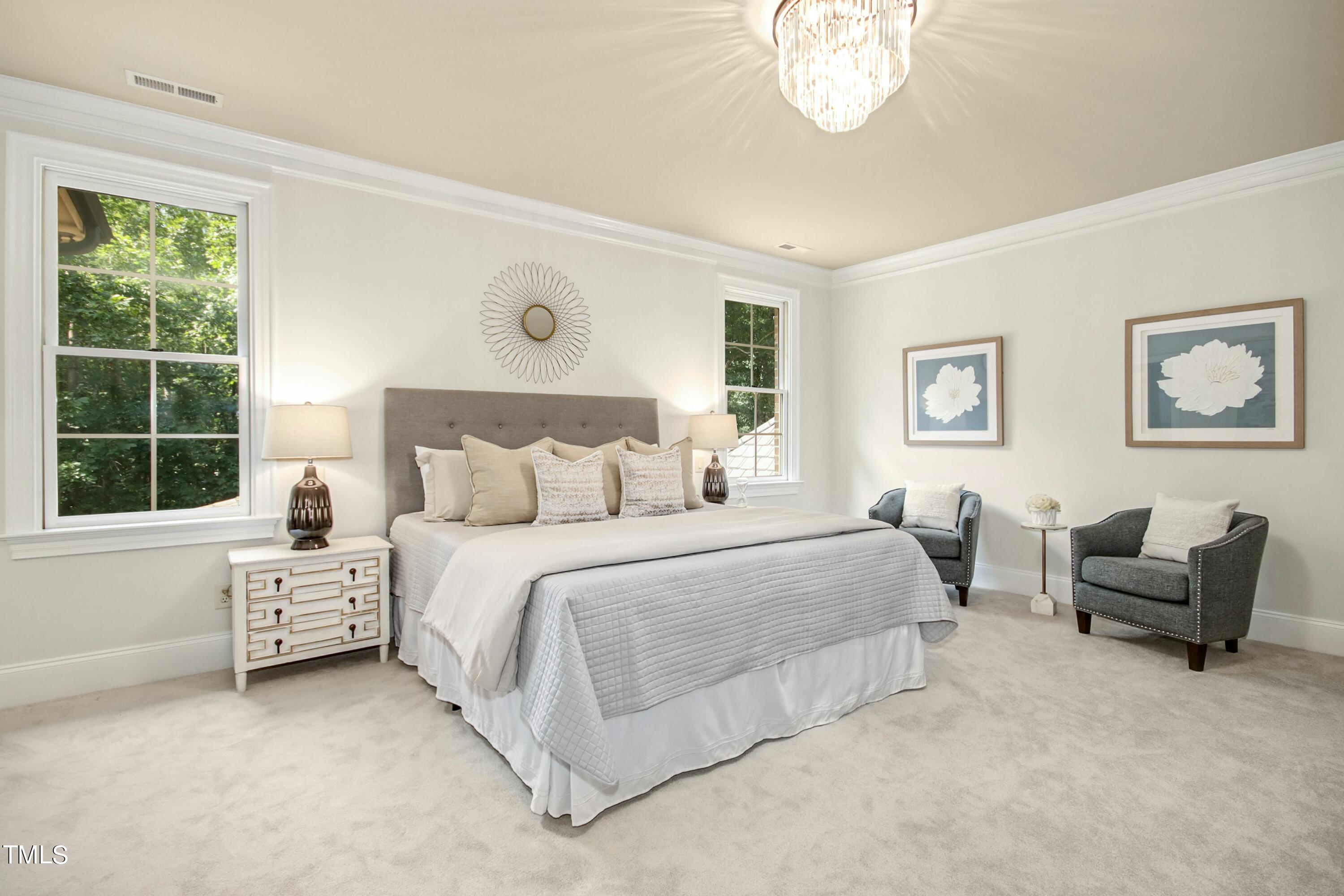 5513 Hickory Leaf Drive Raleigh, NC 27606 - Photo 14 of 41 a bedroom with bed and a large window