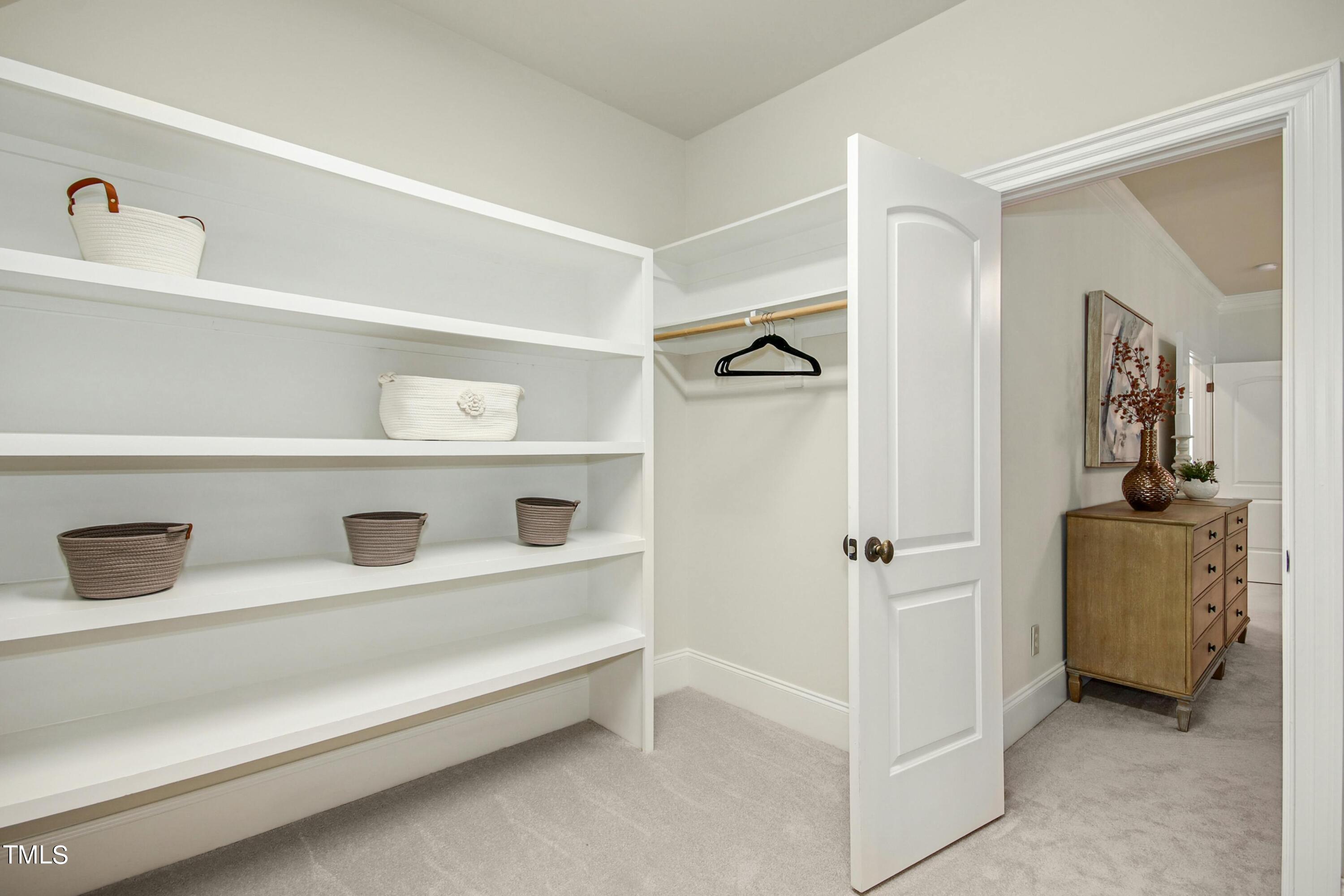 5513 Hickory Leaf Drive Raleigh, NC 27606 - Photo 20 of 41 a view of closet area