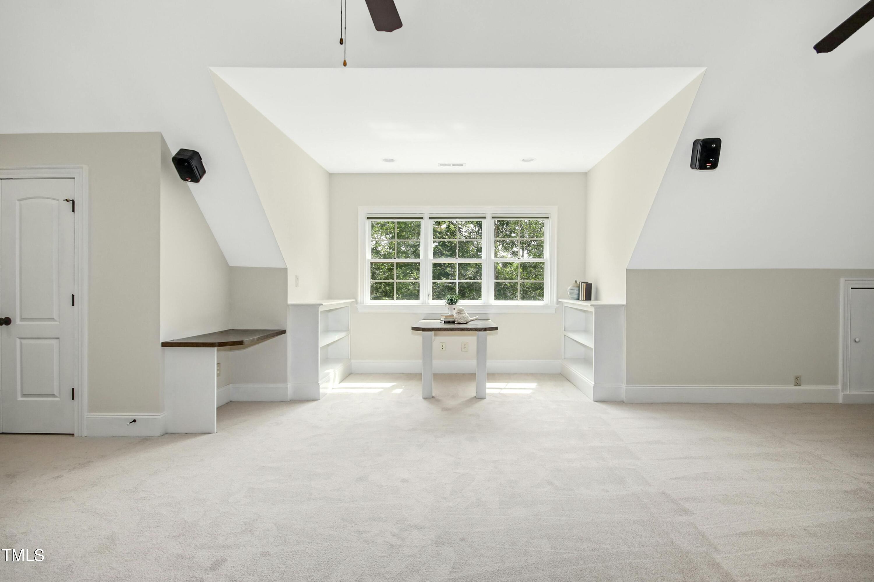 5513 Hickory Leaf Drive Raleigh, NC 27606 - Photo 23 of 41 a living room with furniture and a large window
