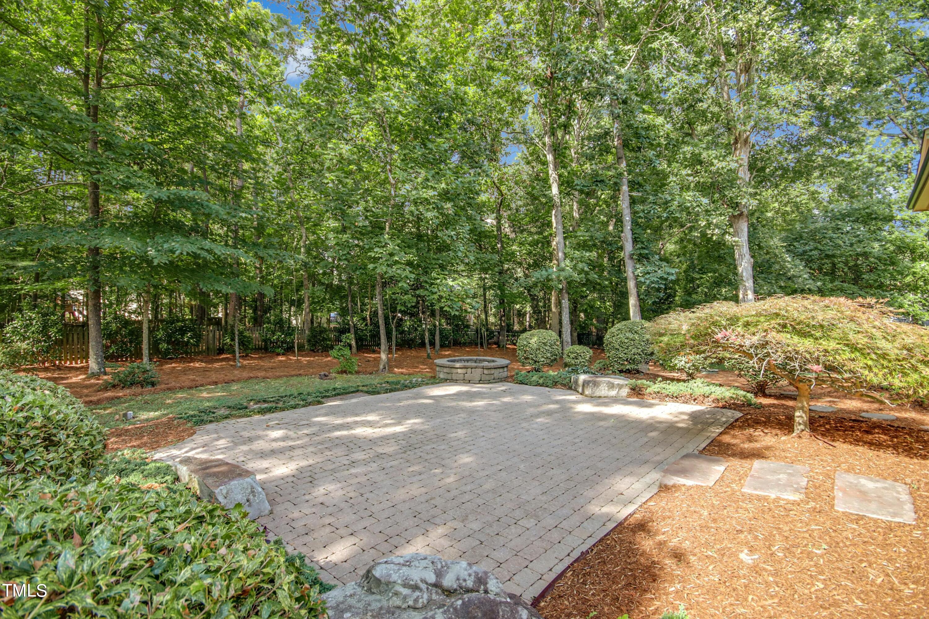5513 Hickory Leaf Drive Raleigh, NC 27606 - Photo 30 of 41 a view of a yard with large trees