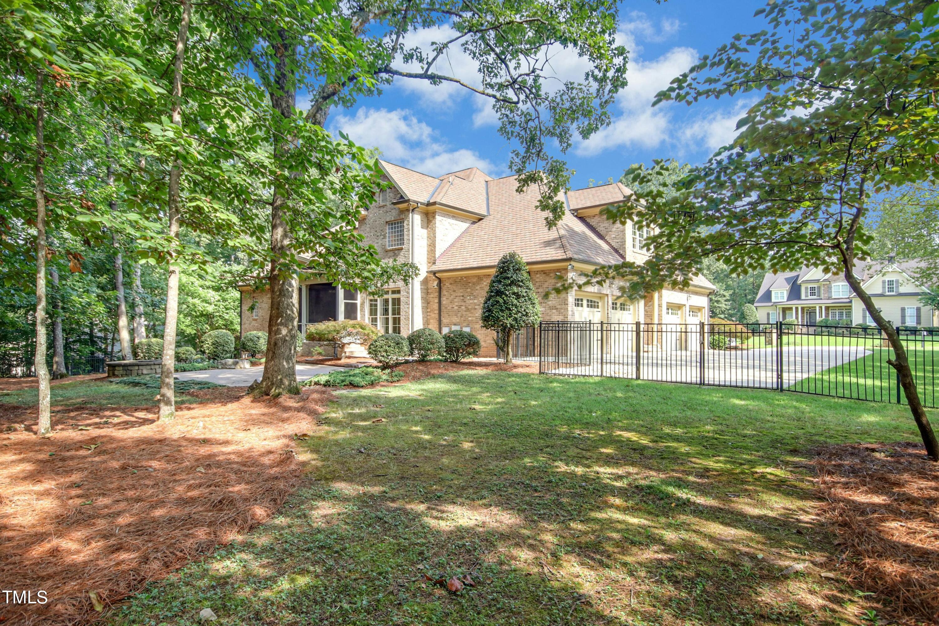 5513 Hickory Leaf Drive Raleigh, NC 27606 - Photo 32 of 41 a view of a yard with a tree