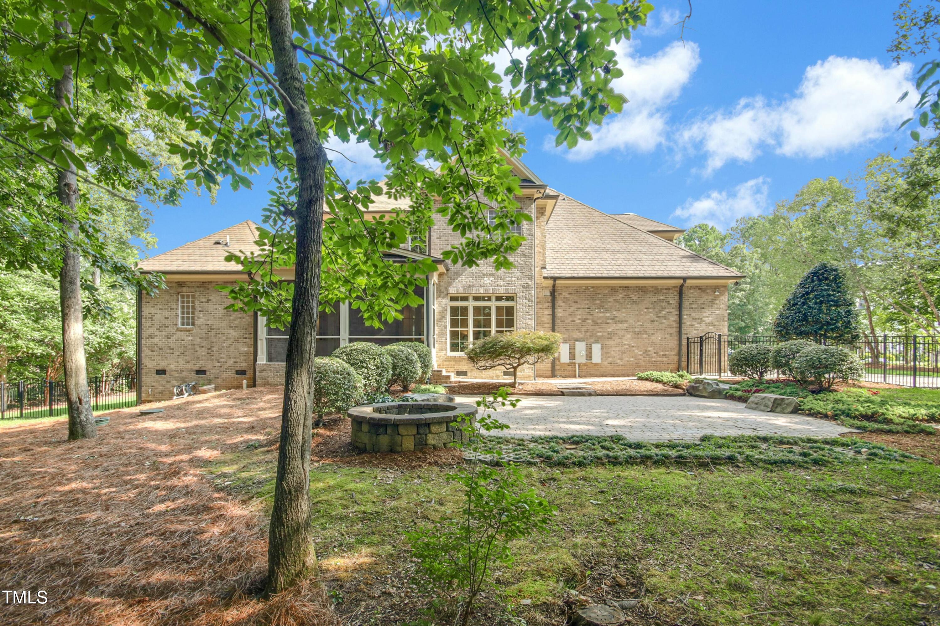 5513 Hickory Leaf Drive Raleigh, NC 27606 - Photo 33 of 41 a view of a house with backyard and sitting area