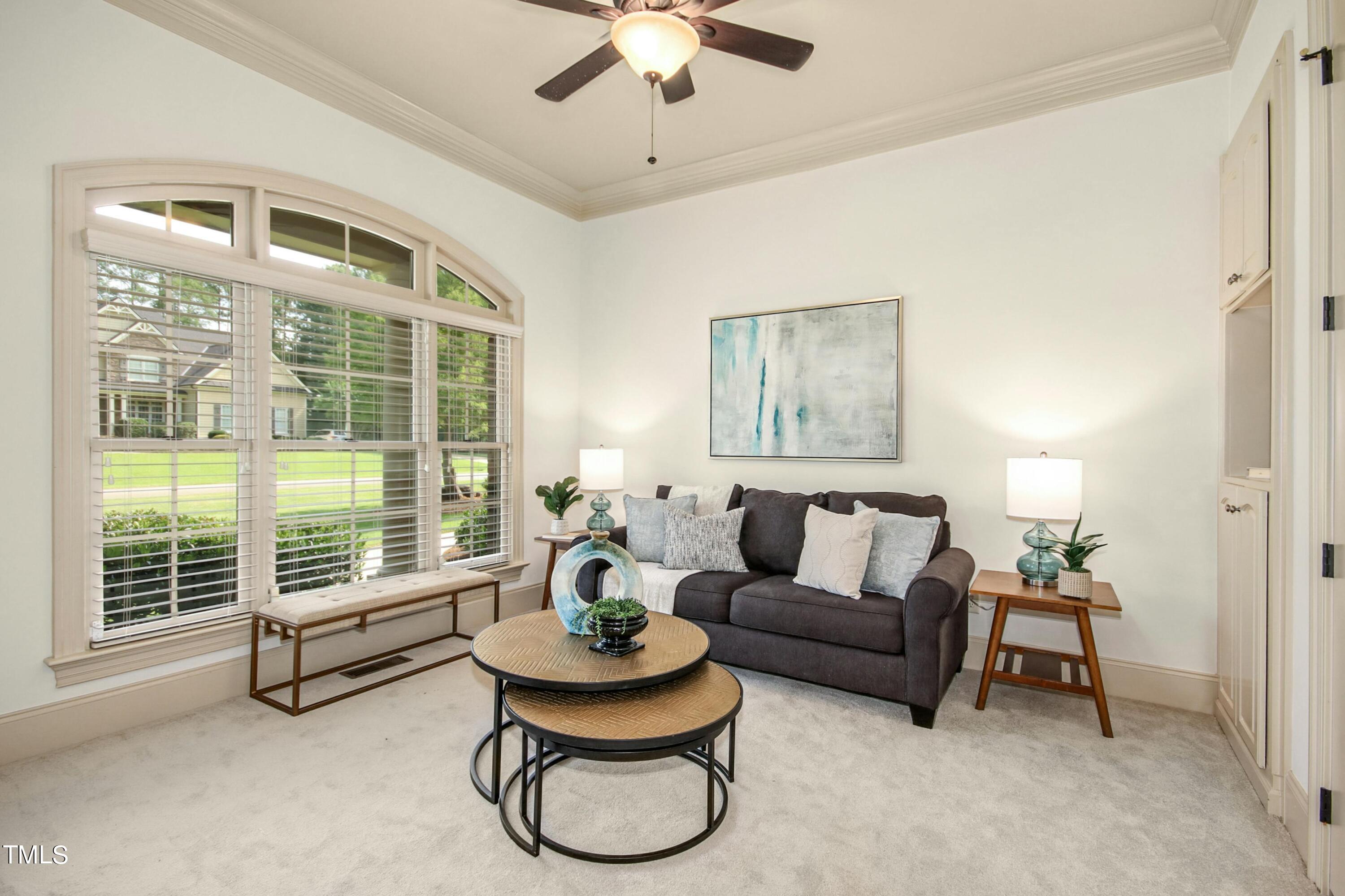 5513 Hickory Leaf Drive Raleigh, NC 27606 - Photo 35 of 41 a living room with furniture and a large window