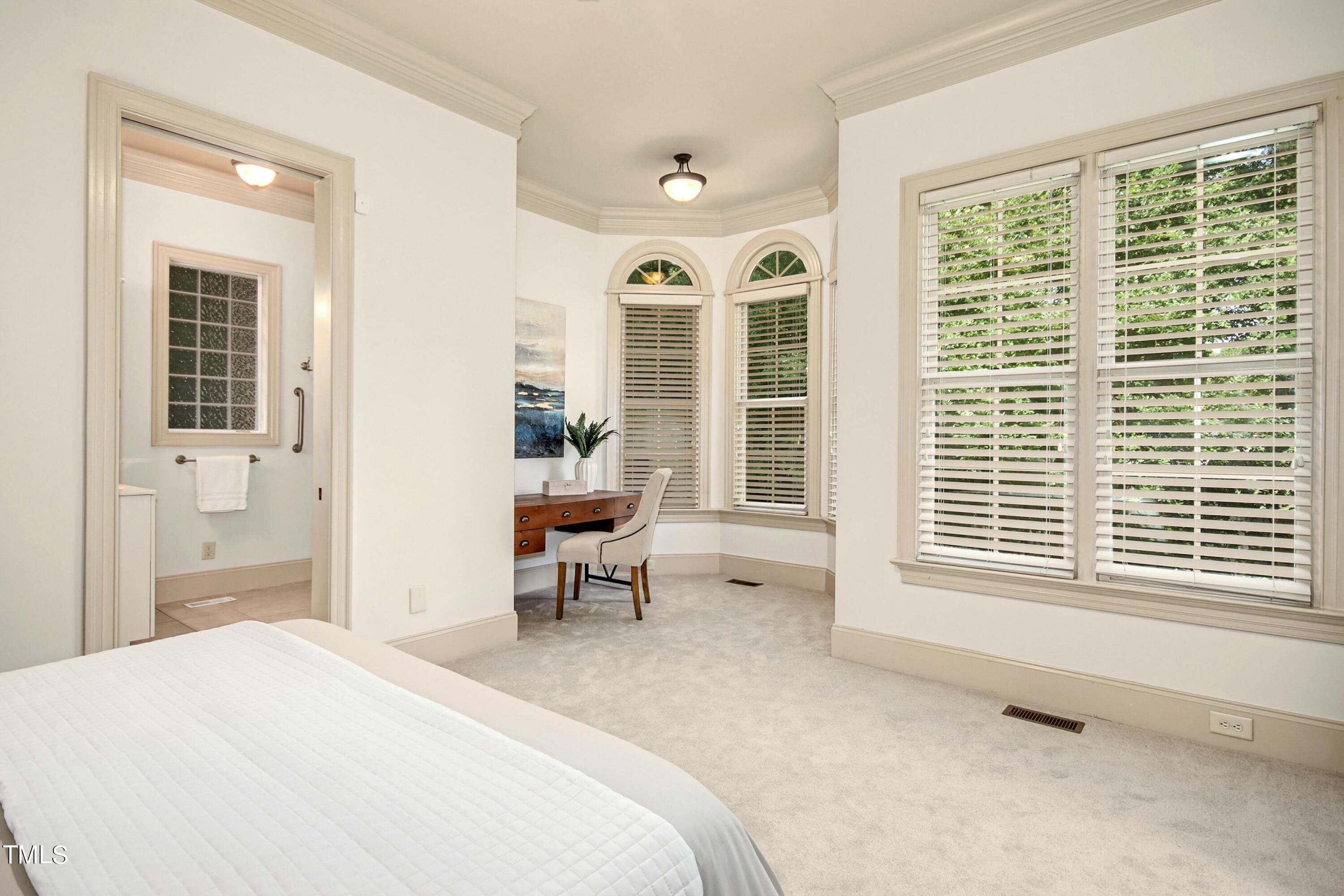 5513 Hickory Leaf Drive Raleigh, NC 27606 - Photo 37 of 41 a bedroom with furniture and a window