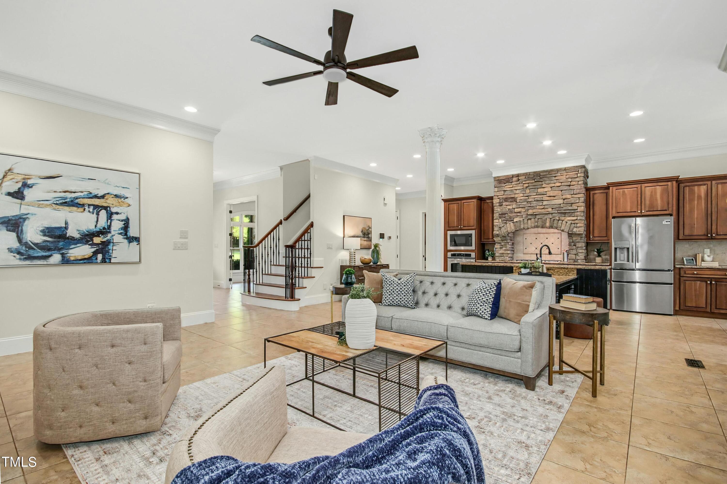 5513 Hickory Leaf Drive Raleigh, NC 27606 - Photo 7 of 41 a living room with furniture and kitchen view