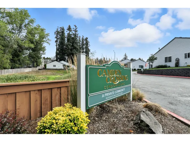 a view of a wooden fence