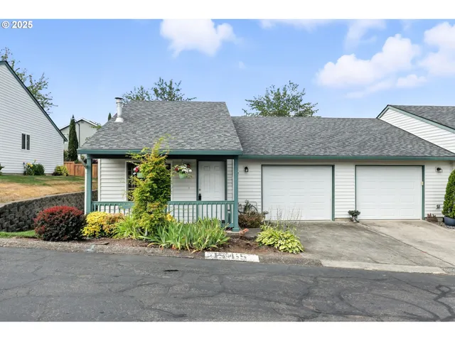 a picture of a bench in front of a wall