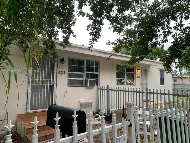 a front view of a house with a porch