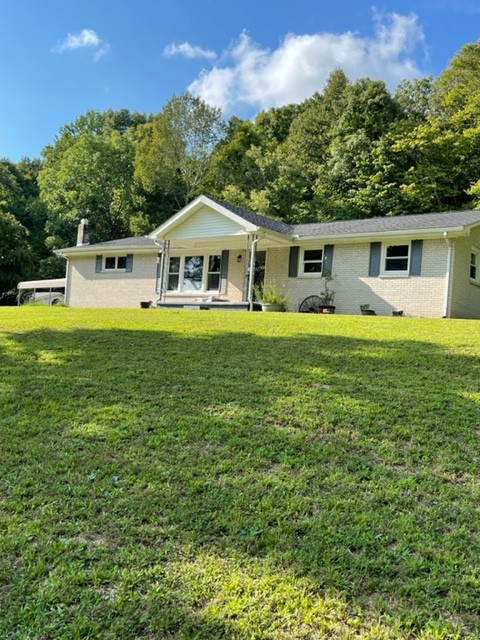2050 Limekiln Road Tennessee Ridge, TN 37178 - Photo 1 of 37 a front view of a house with a garden