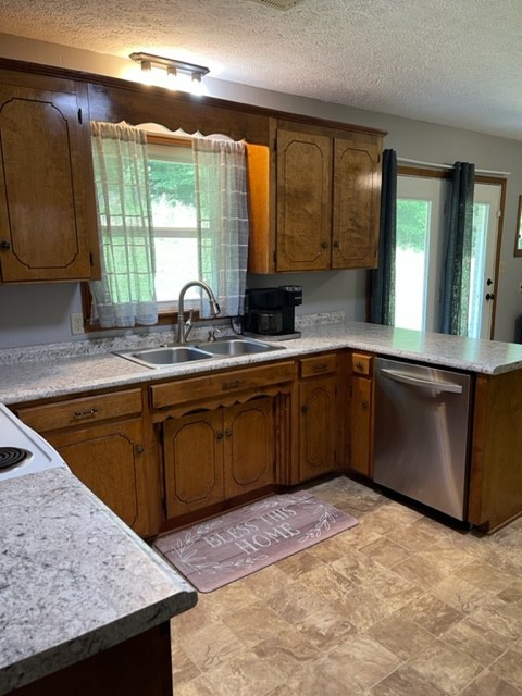 2050 Limekiln Road Tennessee Ridge, TN 37178 - Photo 11 of 37 a kitchen with a sink a counter top space and cabinets