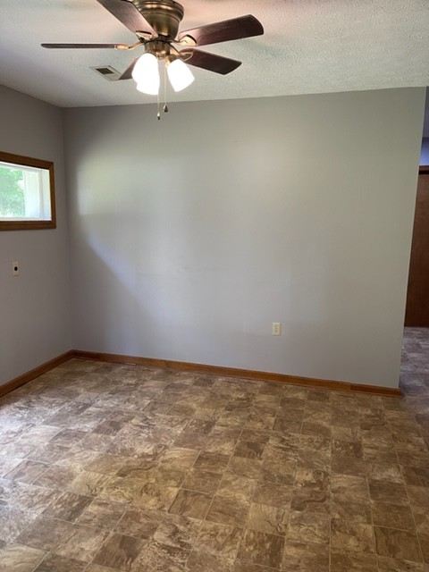 2050 Limekiln Road Tennessee Ridge, TN 37178 - Photo 14 of 37 an empty room with a ceiling fan and a window