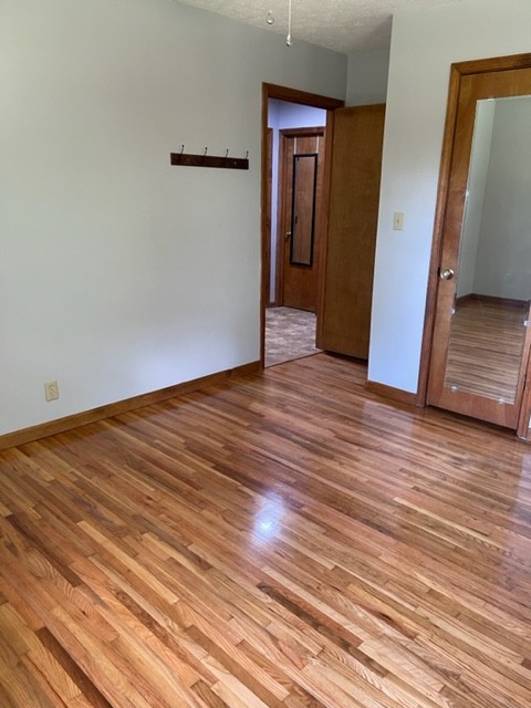 2050 Limekiln Road Tennessee Ridge, TN 37178 - Photo 18 of 37 a view of an empty room with wooden floor
