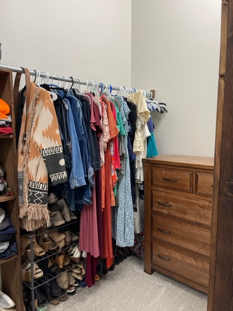 2050 Limekiln Road Tennessee Ridge, TN 37178 - Photo 29 of 37 a view of walk in closet with clothes and shoes