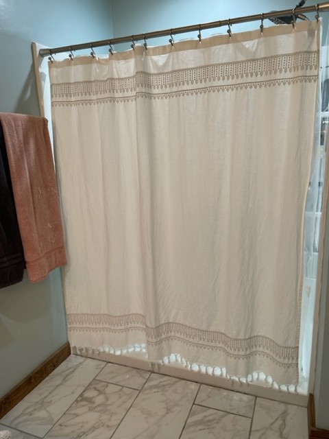 2050 Limekiln Road Tennessee Ridge, TN 37178 - Photo 34 of 37 a bathroom with a shower curtain