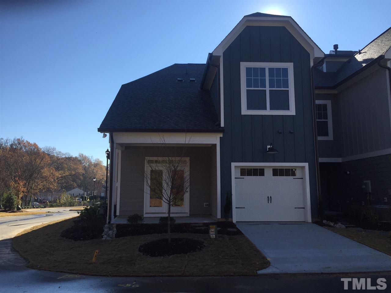 704 Fallon Grove Way Raleigh, NC 27608 - Photo 15 of 15 a front view of a house with a yard