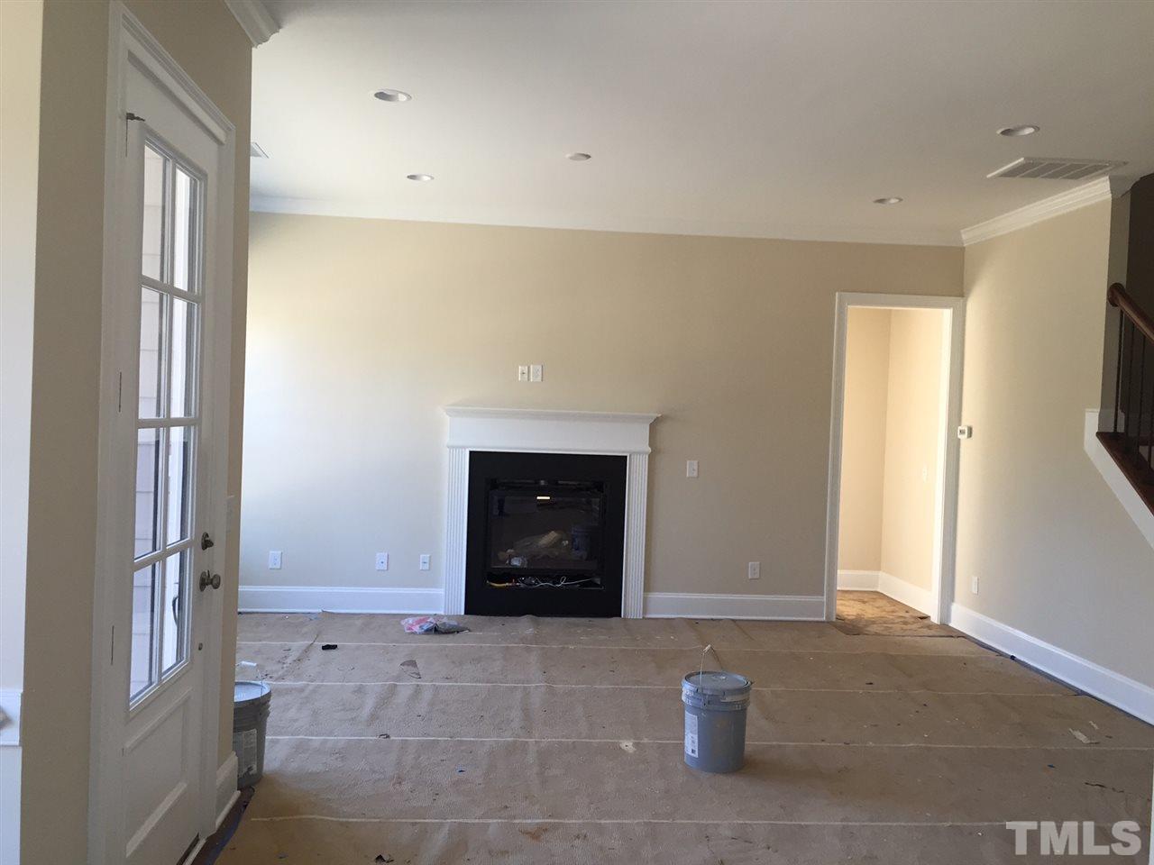 704 Fallon Grove Way Raleigh, NC 27608 - Photo 6 of 15 a view of an empty room with a window