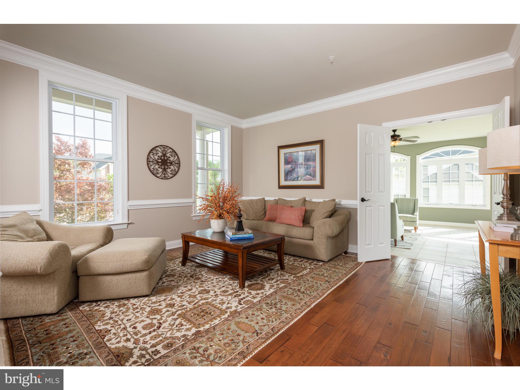 33 Wilson Way Phoenixville, PA 19460 - Photo 19 of 53 Living room with wood floors and large windows