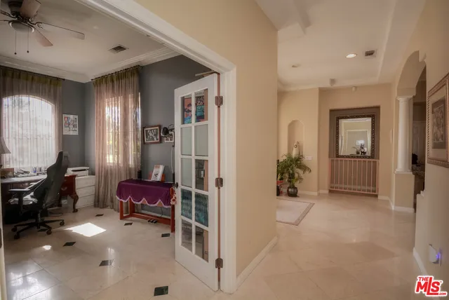 a view of room with furniture and windows