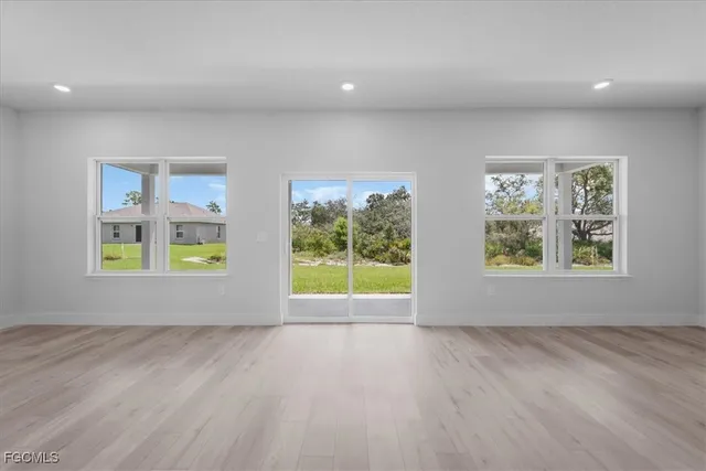 an empty room with windows