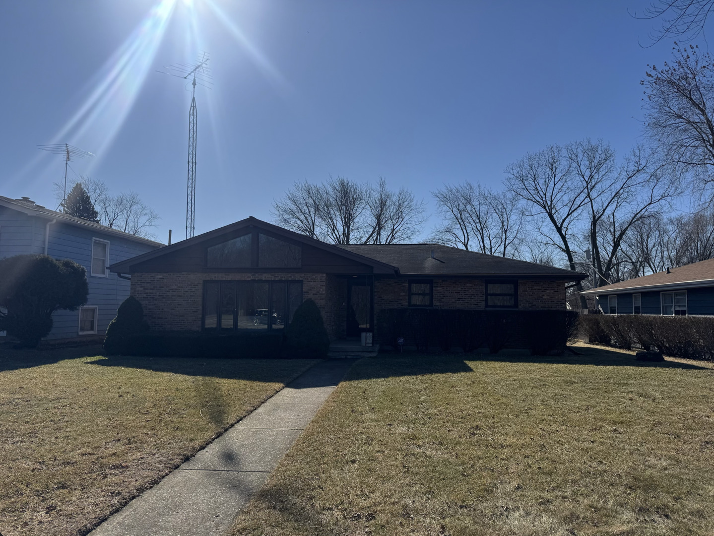 a front view of house with a yard