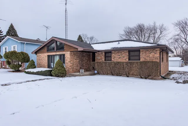 a room with gym equipment and a window