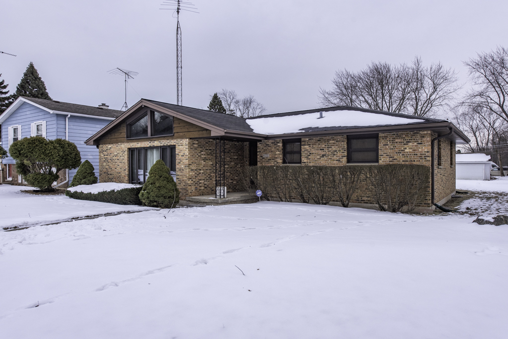 2009 Kedron Boulevard Zion, IL 60099 - Photo 21 of 30 a front view of a house with a yard