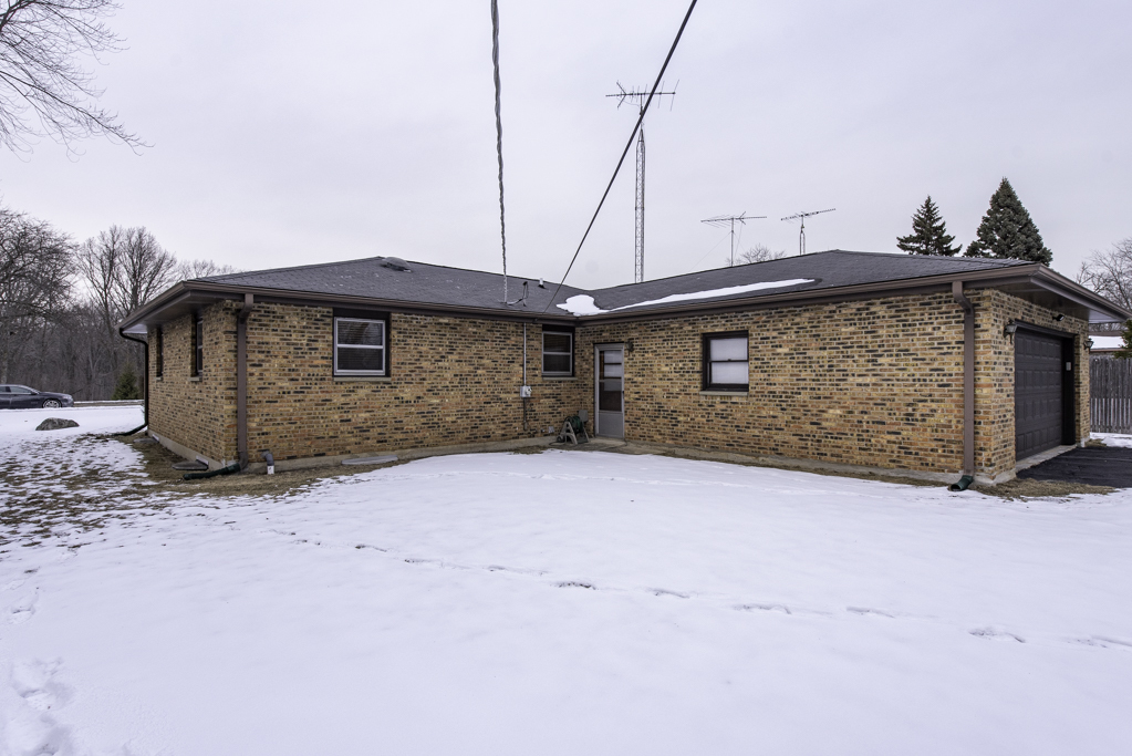 2009 Kedron Boulevard Zion, IL 60099 - Photo 25 of 30 a front view of a house with a yard