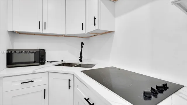 a bathroom with a toilet and a sink