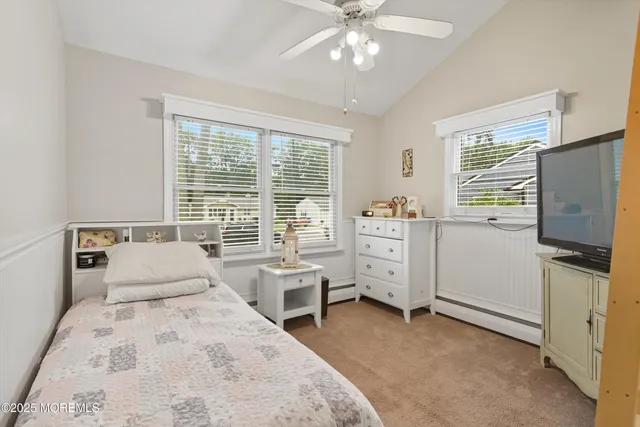 a bedroom with a bed and furniture