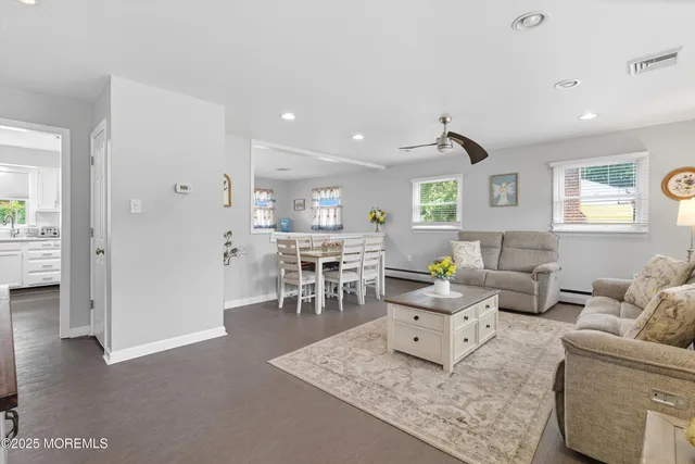 a living room with furniture and a table