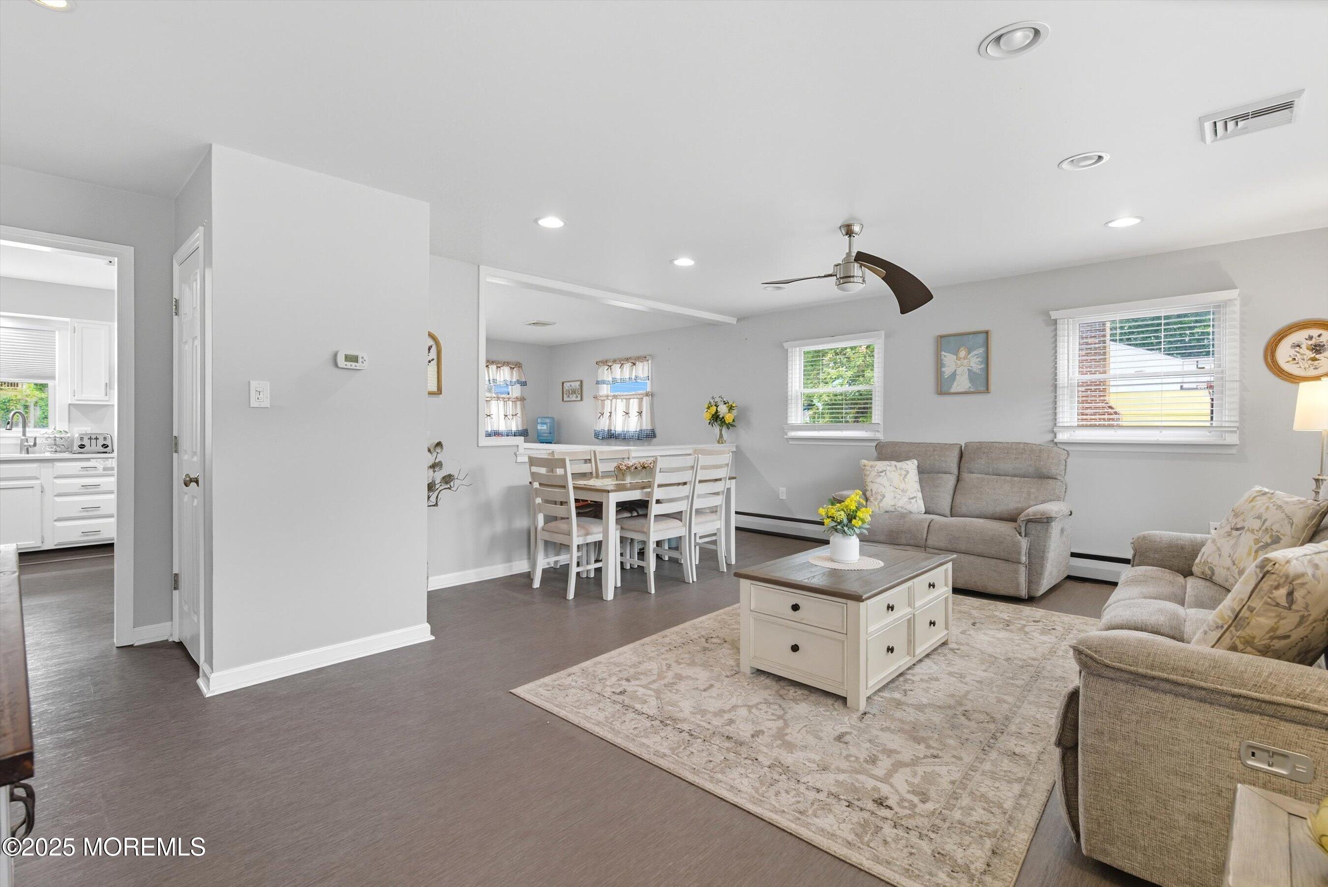 210 Coolidge Avenue Absecon, NJ 08201 - Photo 3 of 28 a living room with furniture and a table