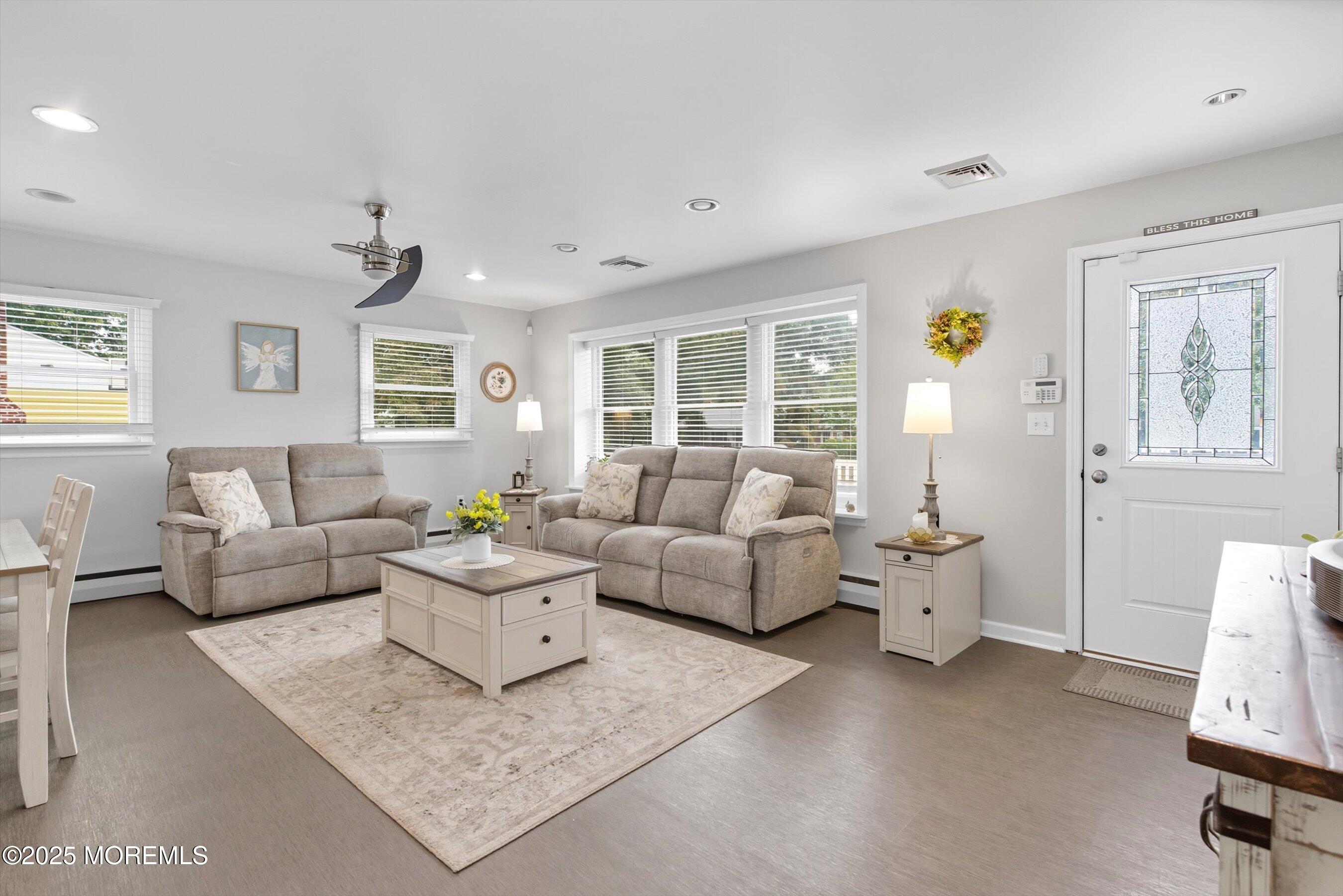 210 Coolidge Avenue Absecon, NJ 08201 - Photo 4 of 28 a living room with furniture and a window
