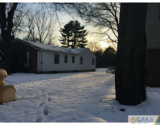 10 Bradford Road Edison, NJ 08820 - Photo 2 of 13 a backyard of a house
