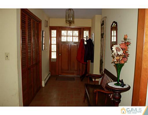 10 Bradford Road Edison, NJ 08820 - Photo 10 of 13 a bathroom with mirror and window
