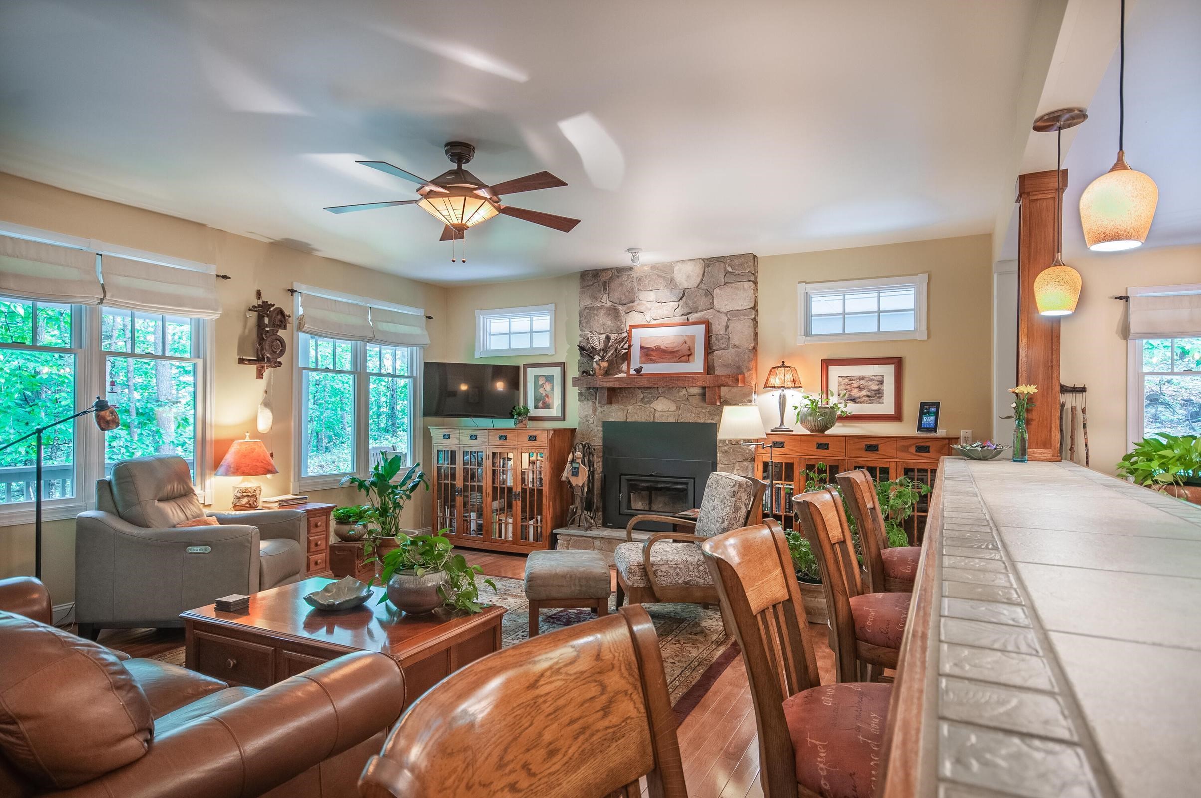 151 Stonebrook Road Amherst, VA 24521 - Photo 26 of 74 Sit at the kitchen counter and chat with your friends and family in the living room.