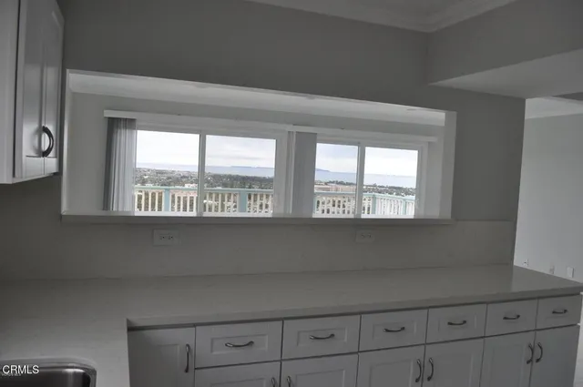 a living room with windows