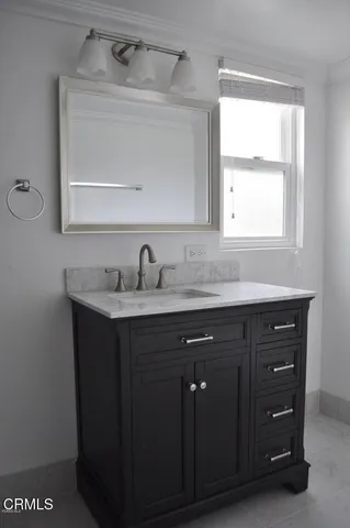 a sink with a mirror