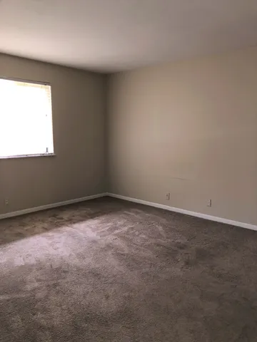 an empty room with a window